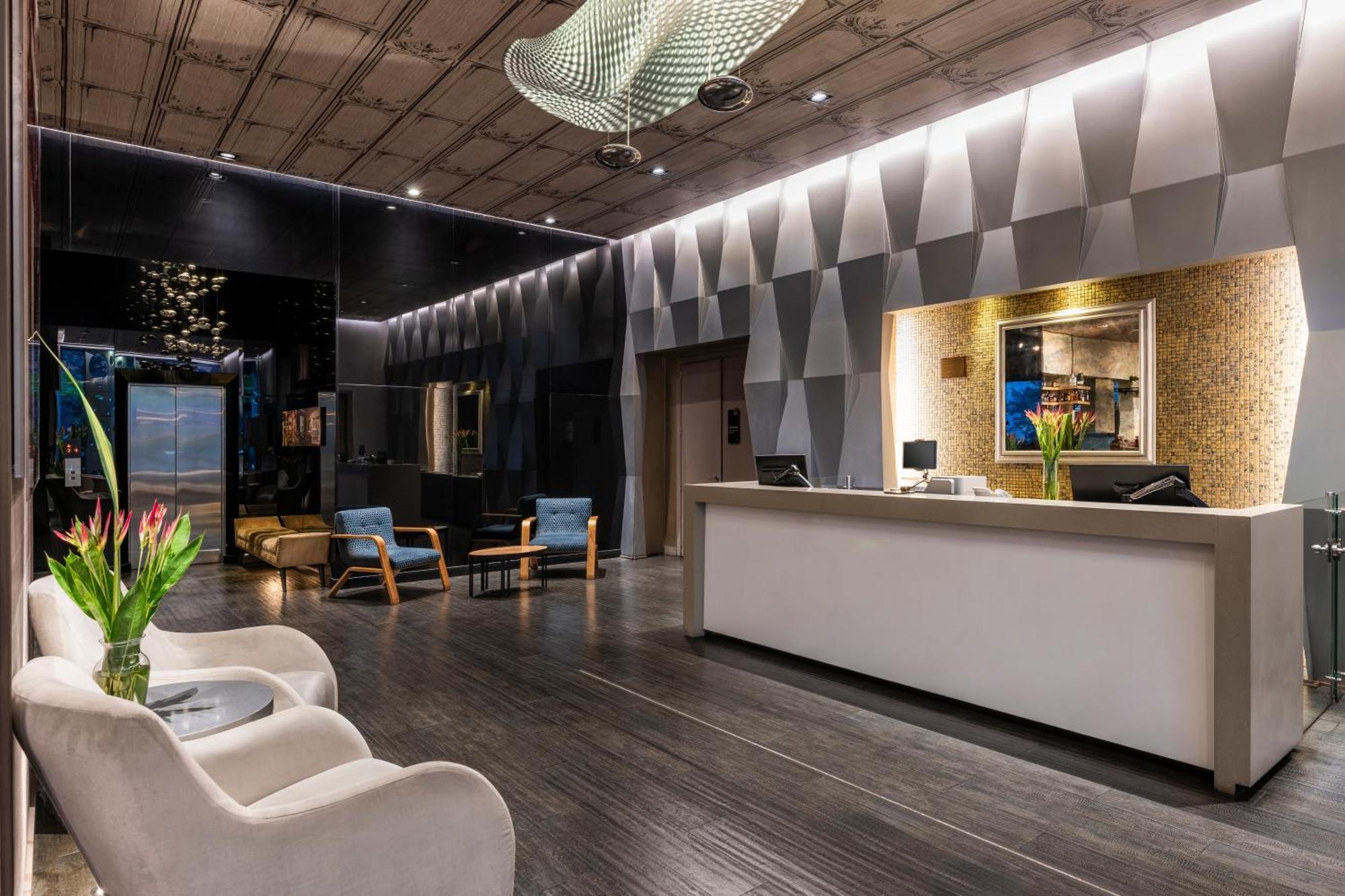 Hotel 100 Luxury Suites By Preferred โบโกตา ภายนอก รูปภาพ The lobby of the hotel