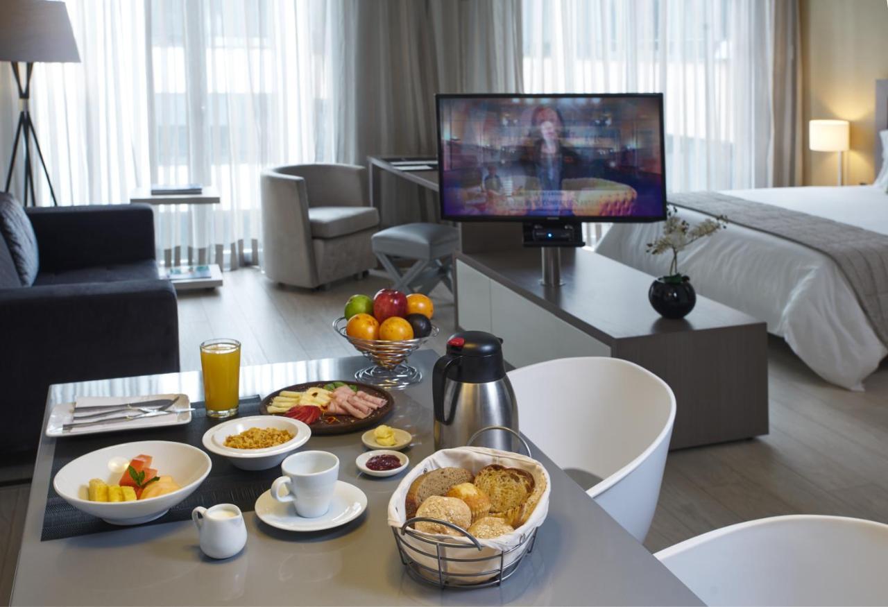 Hotel 100 Luxury Suites By Preferred โบโกตา ภายนอก รูปภาพ A room at the hotel